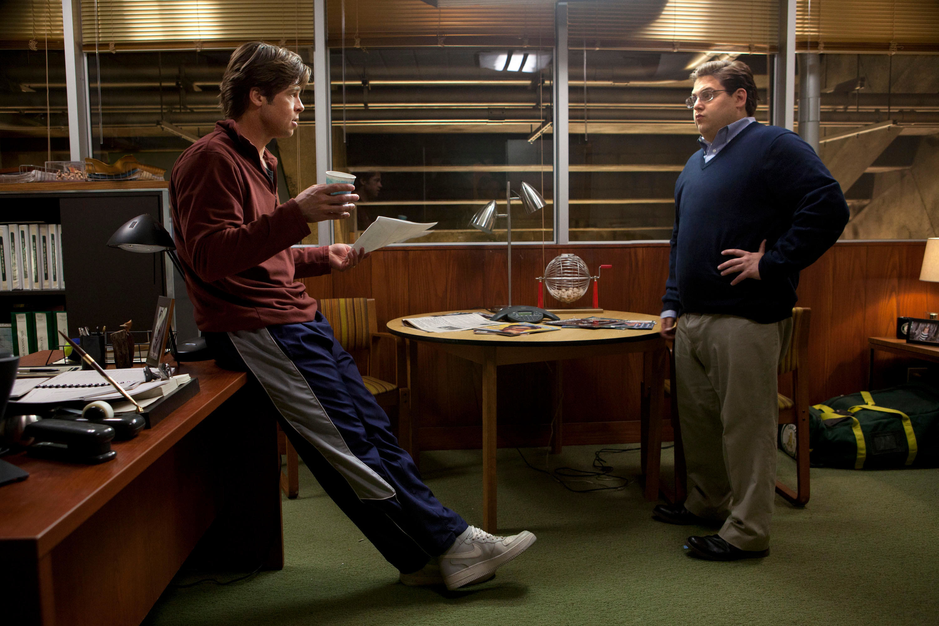 Brad Pitt and Jonah Hill discuss their options in &quot;Moneyball&quot;