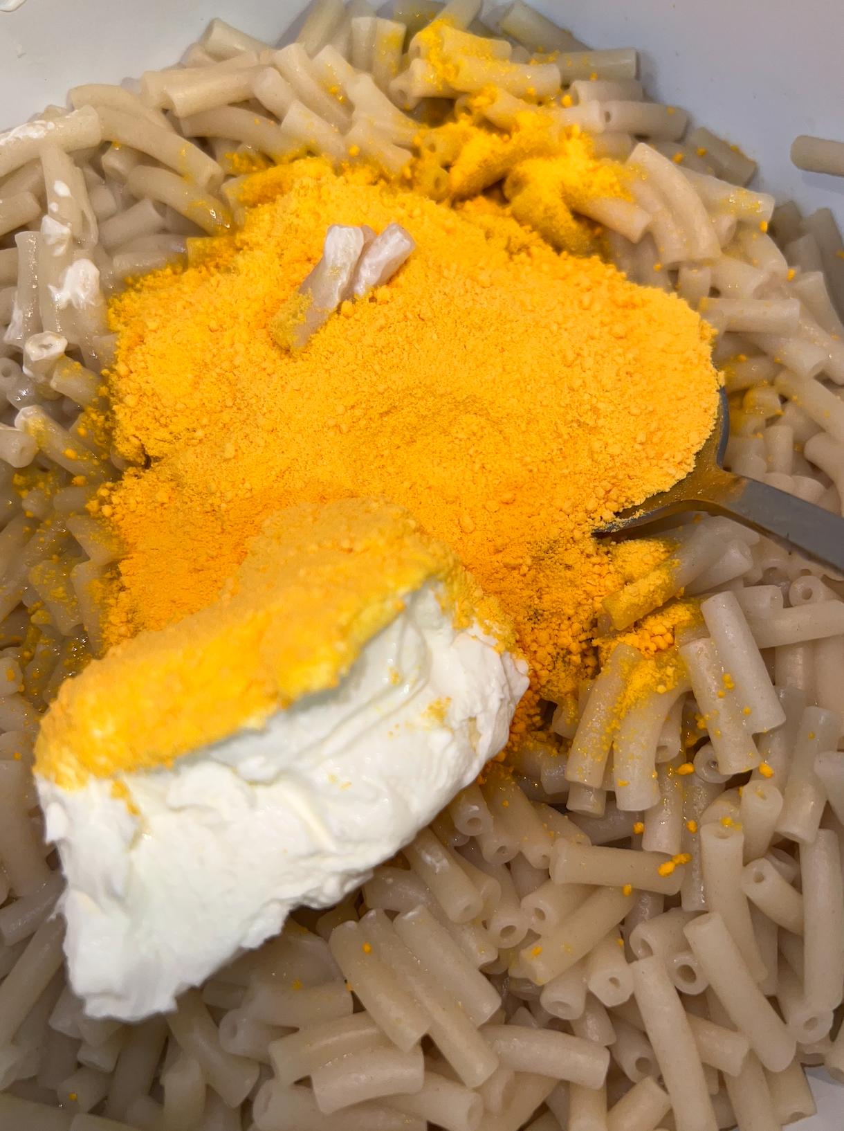 Macaroni, cheese powder, and cream cheese