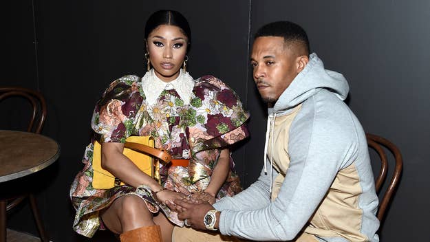 Nicki Minaj sits with her husband kenneth Petty at the Marc Jacobs Fall 2020 runway show during New York Fashion Week