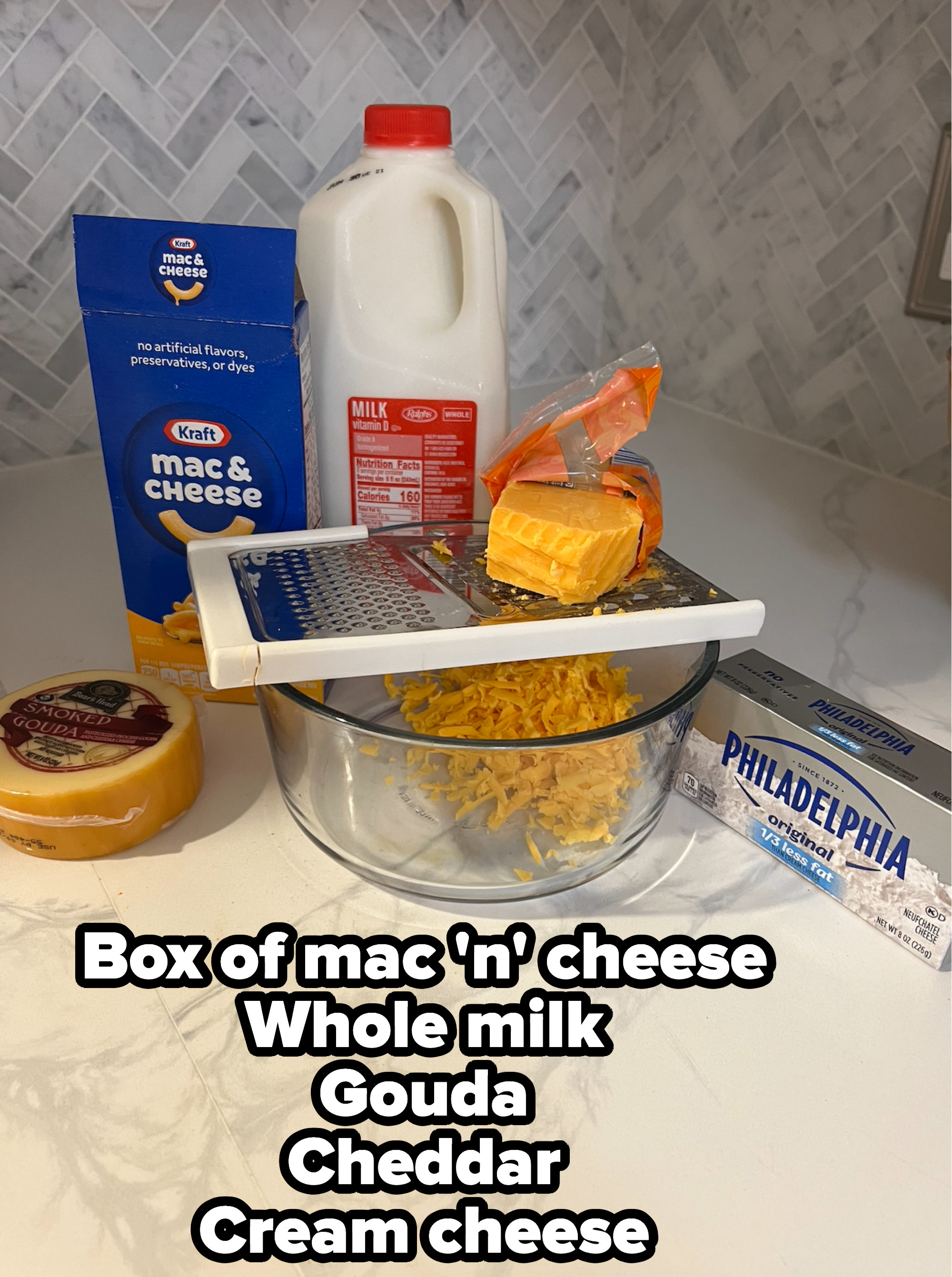 Ingredients: box of mac &#x27;n&#x27; cheese, whole milk, Gouda, cheddar, and cream cheese