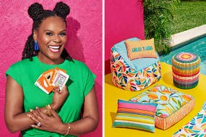 Tabitha Brown holds cards next to colorful poolside furniture