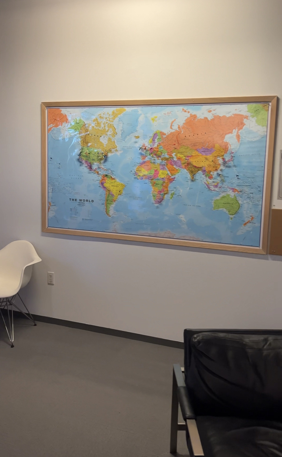 A large framed map on the wall