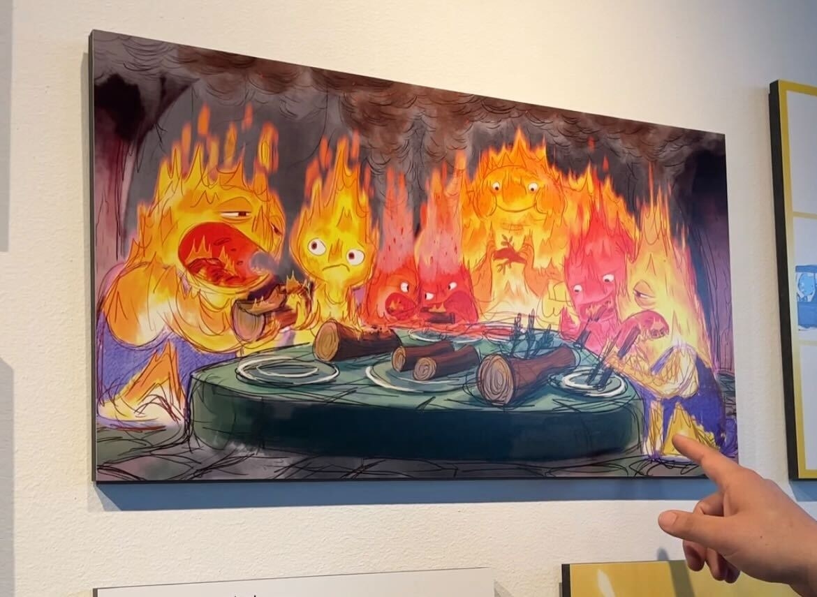 Several fire elements sitting around a table eating spicy foods