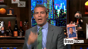 Andy Cohen blowing kisses