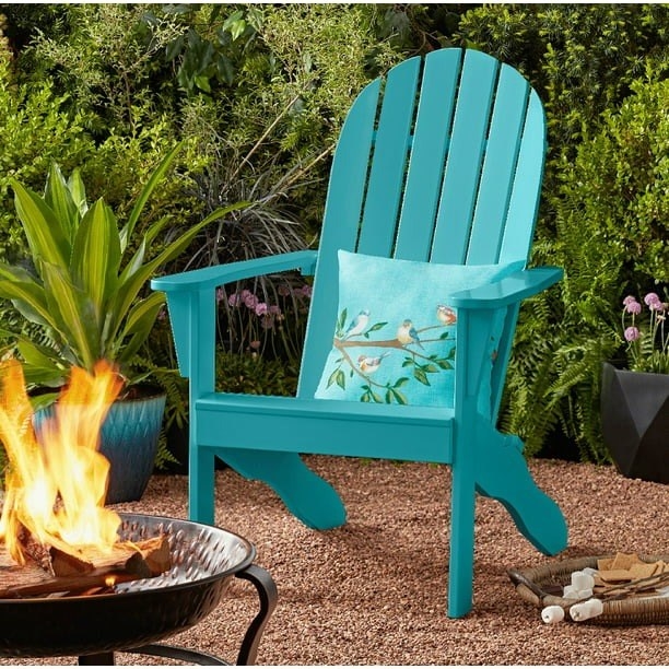 the Adirondack chair beside a fire pit