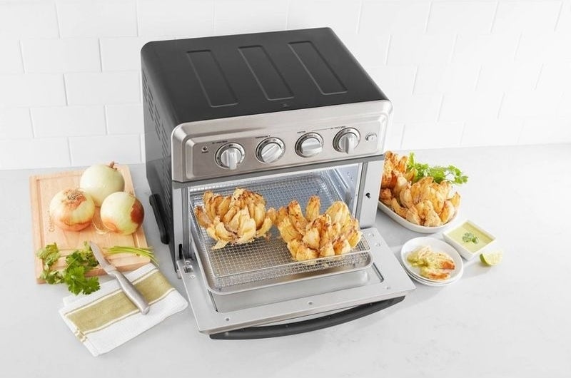 An air fryer with air fried onions