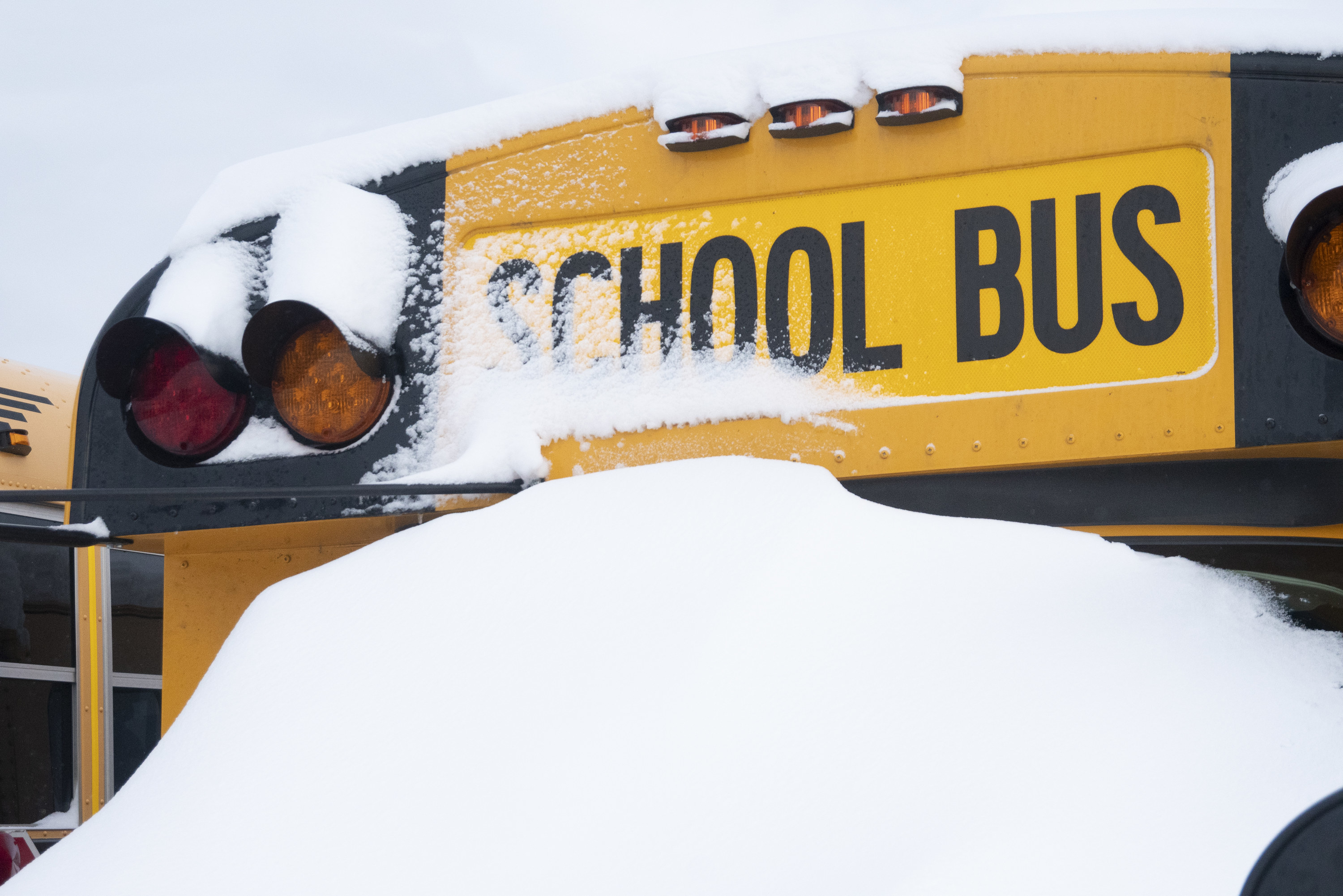 Snow piled on a bus
