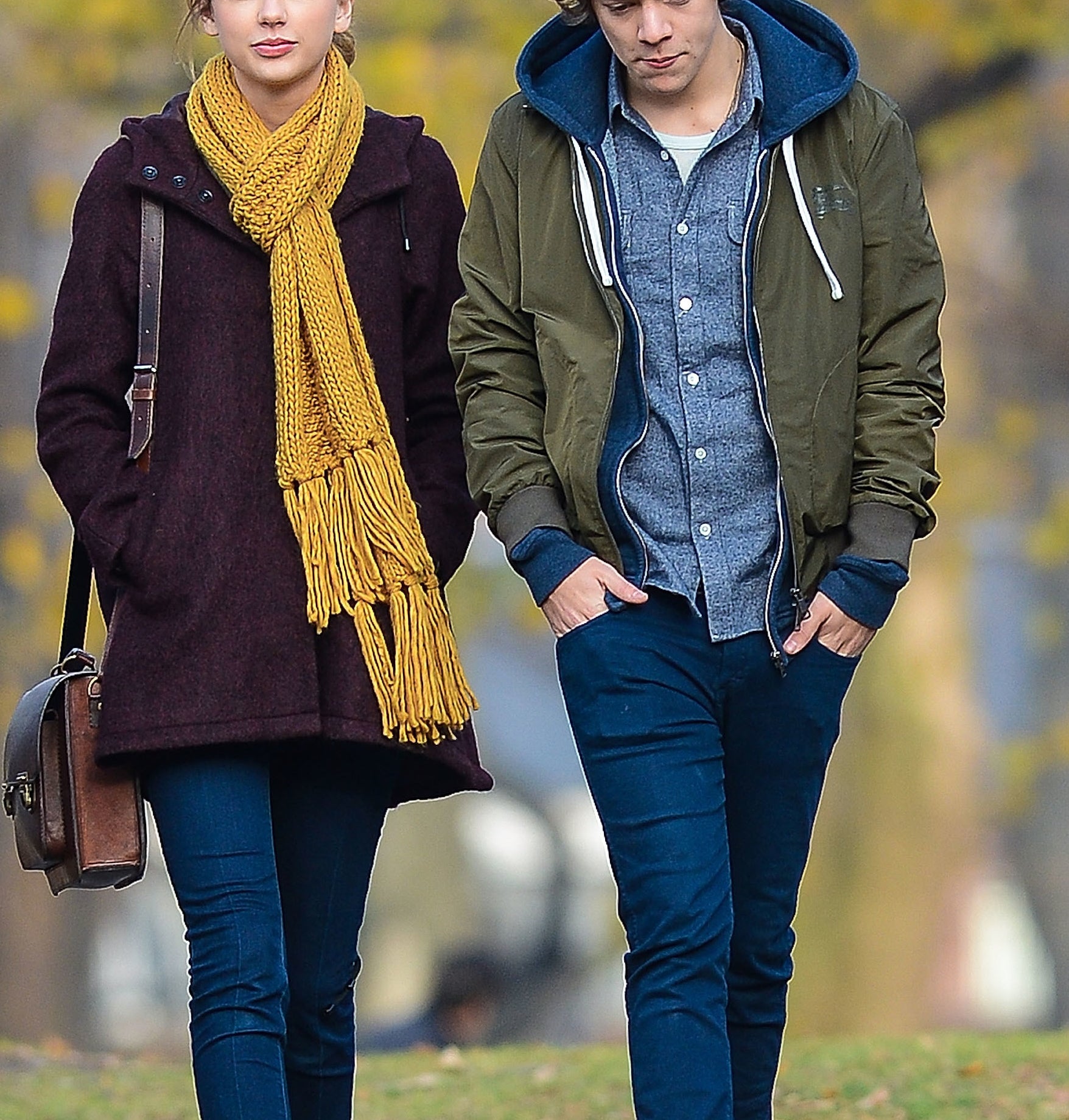Taylor and Harry taking a walk together outside during colder months