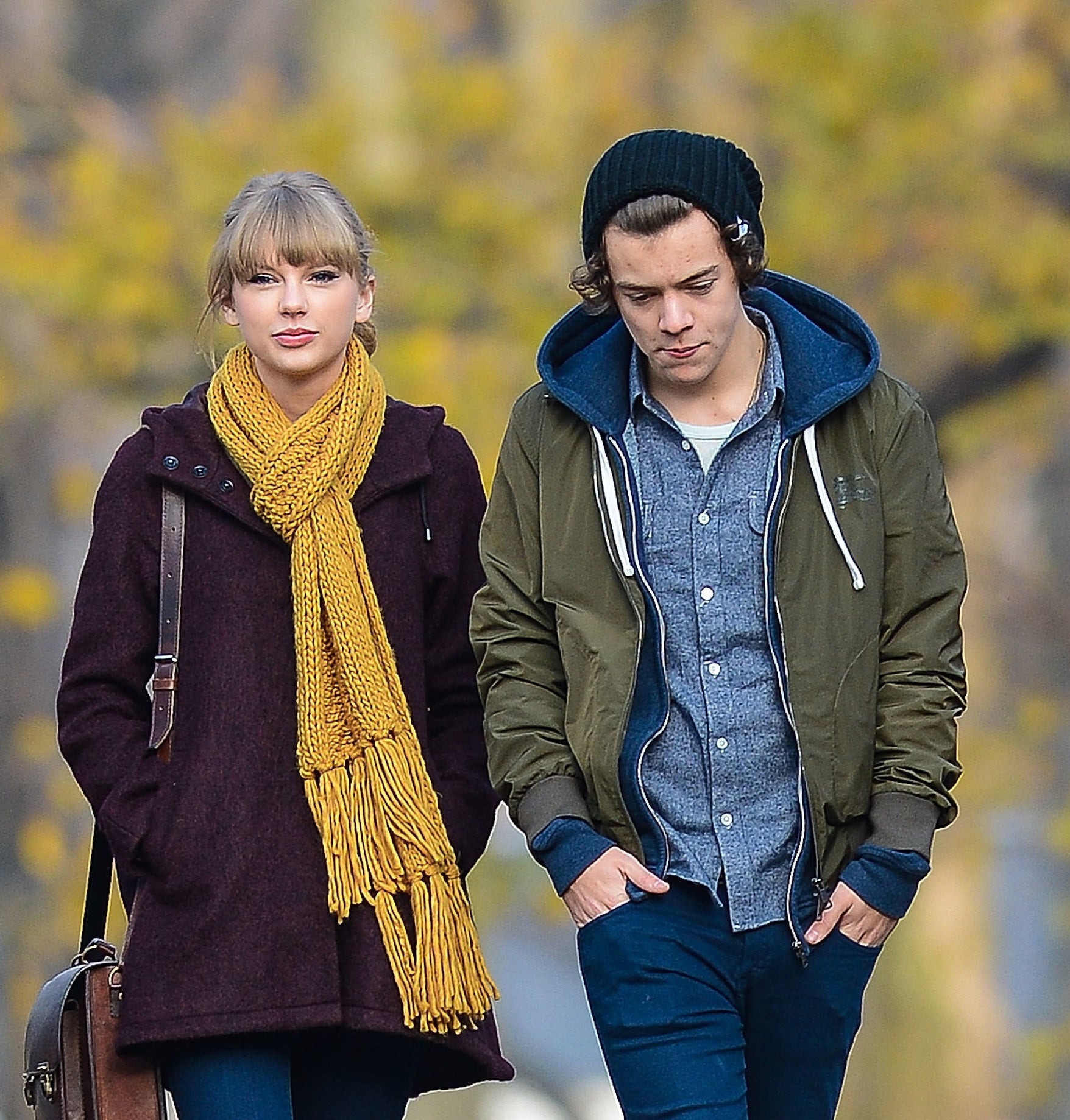 Taylor and Harry taking a walk together outside during colder months