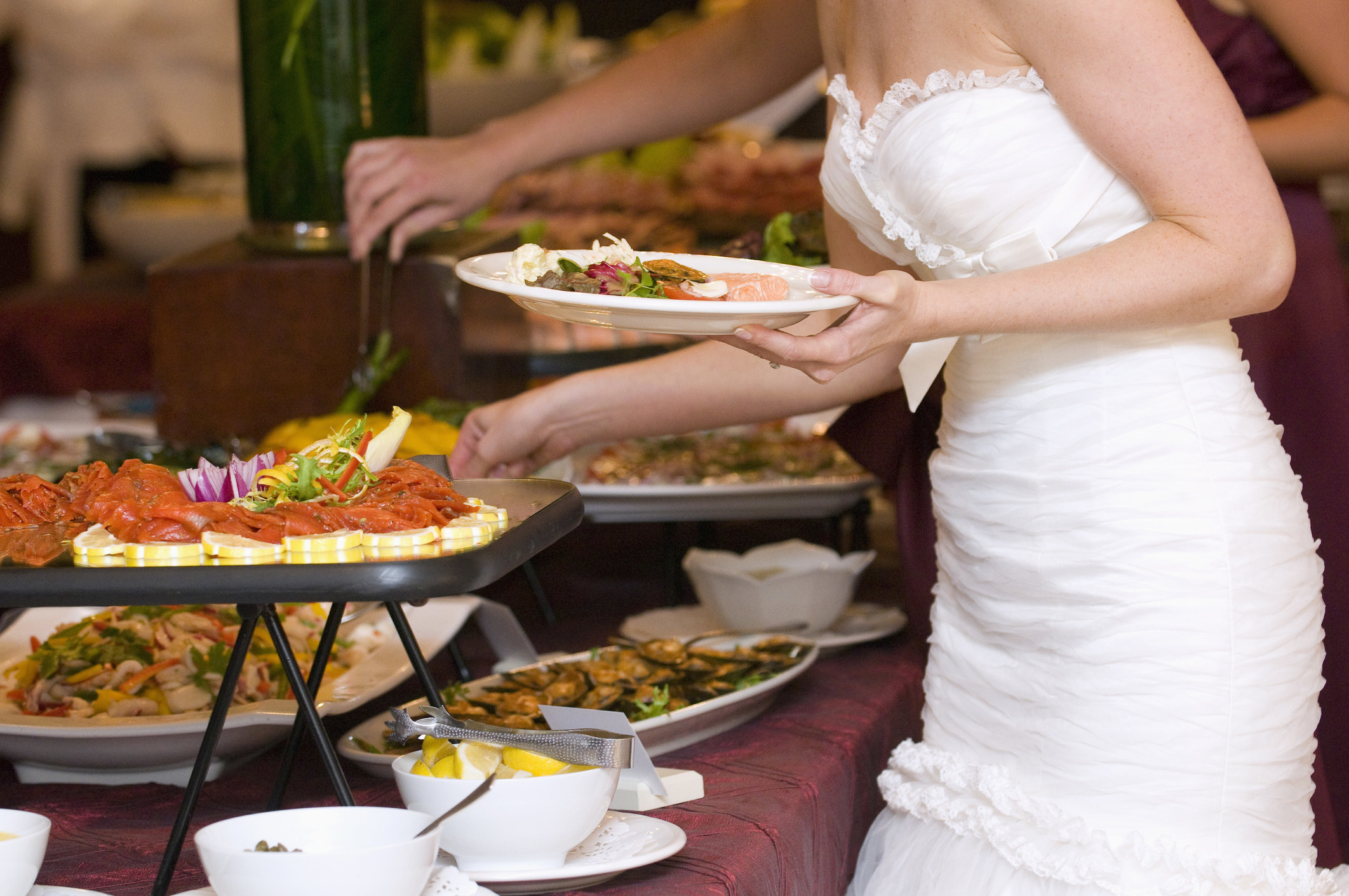 A bride at a buffet