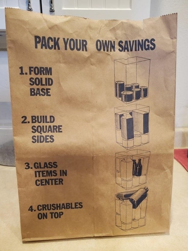 A paper grocery bag with instructions on how to pack it properly