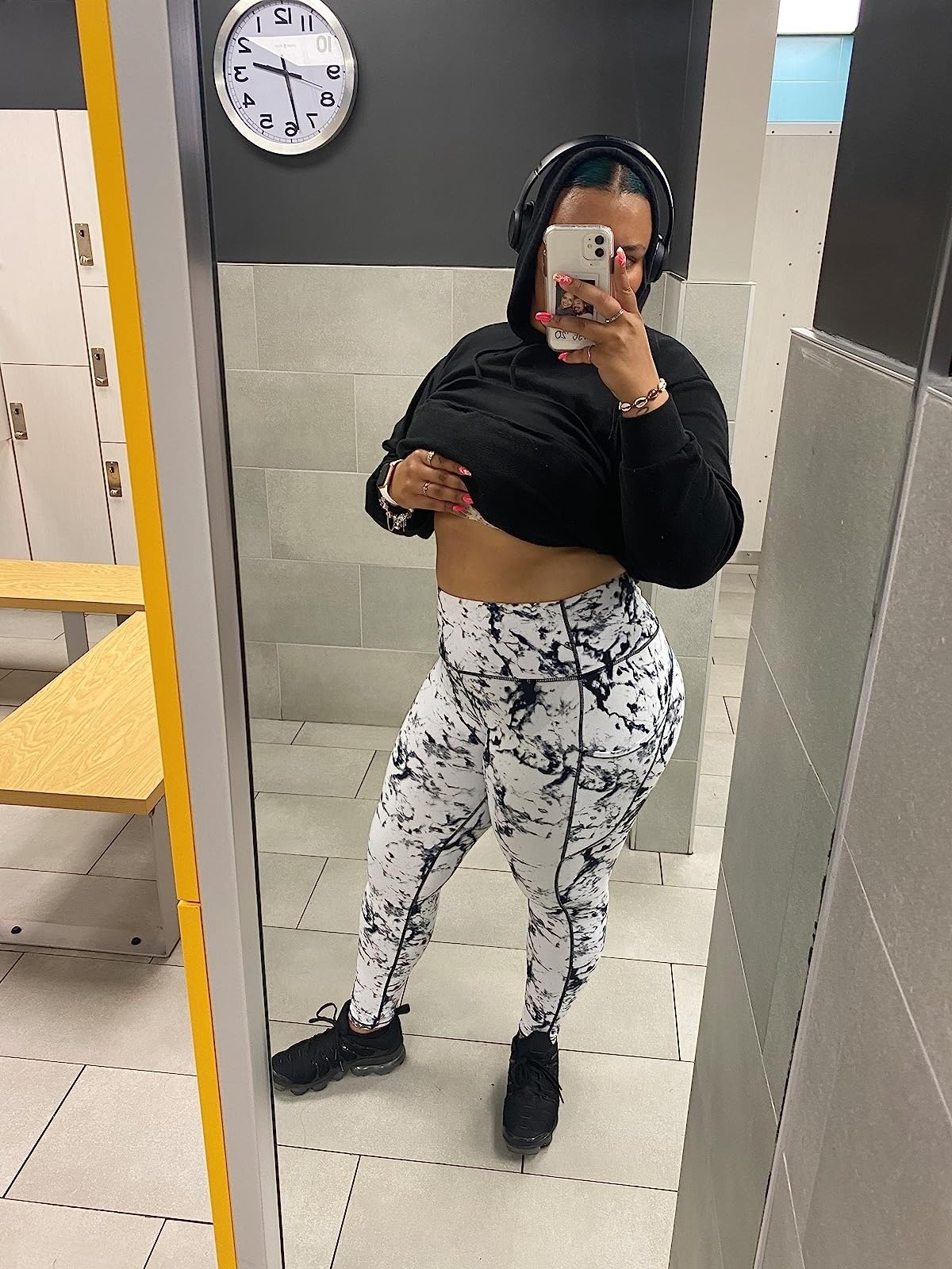 reviewer wearing the black and white leggings