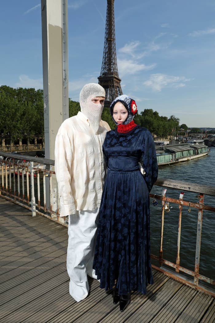 Pinkus and Noah standing in front of the Eiffel Tower in Paris