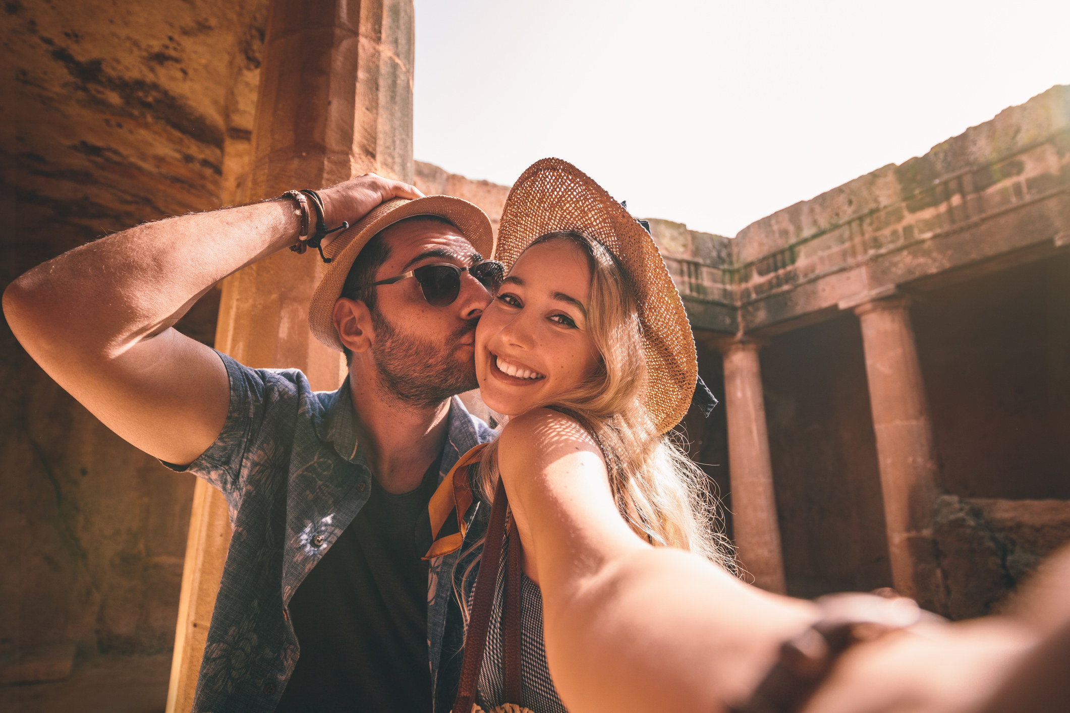 A couple on vacation taking a selfie