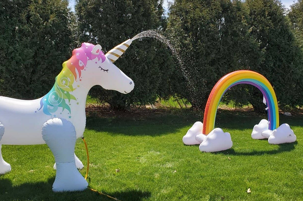 reviewer's large inflatable unicorn that shoots water out of horn