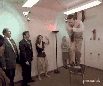 Andy coming off a chair to get into Kelly&#x27;s face in &quot;The Office.&quot;