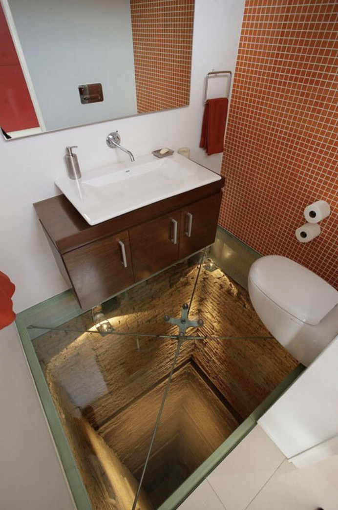 A glass floor in the bathroom