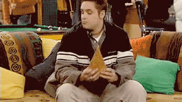 Eric Matthews aggressively eating a slice of pizza in &quot;Boy Meets World&quot;