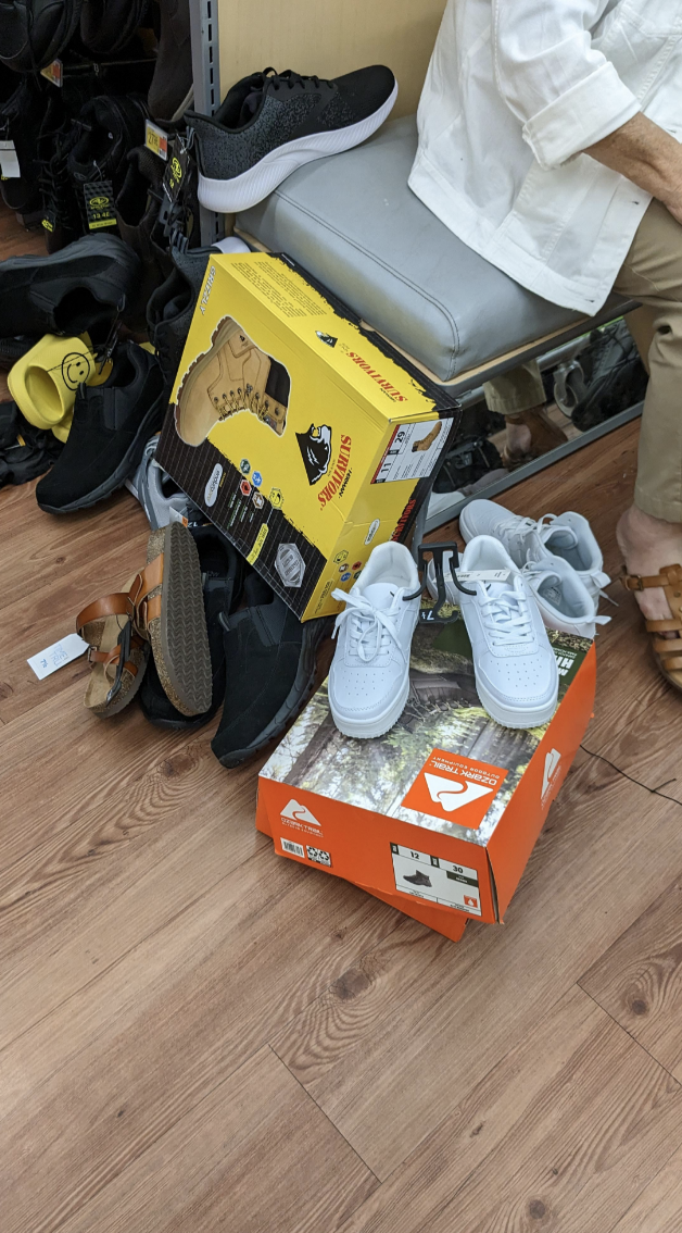 Disorganized sneakers in a shoe store