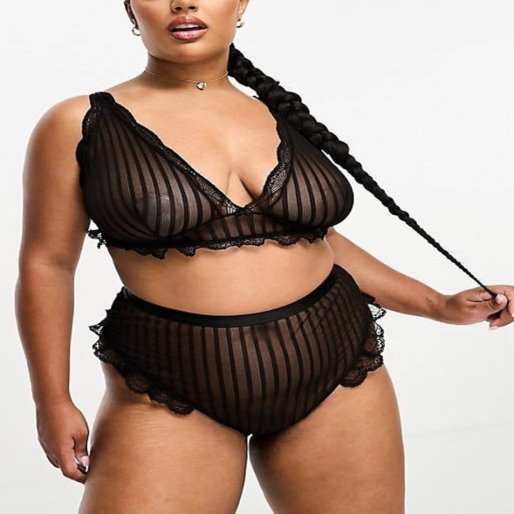 model wearing ribbed mesh bra and underwear set