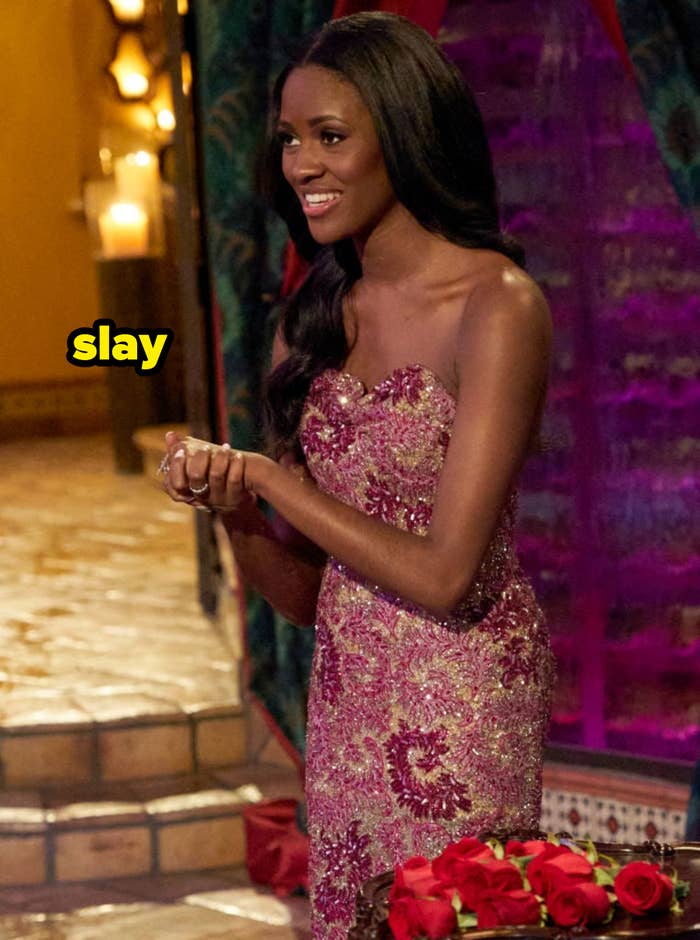 Charity wearing a sequined strapless dress during a rose ceremony with the caption &quot;slay&quot; next to her