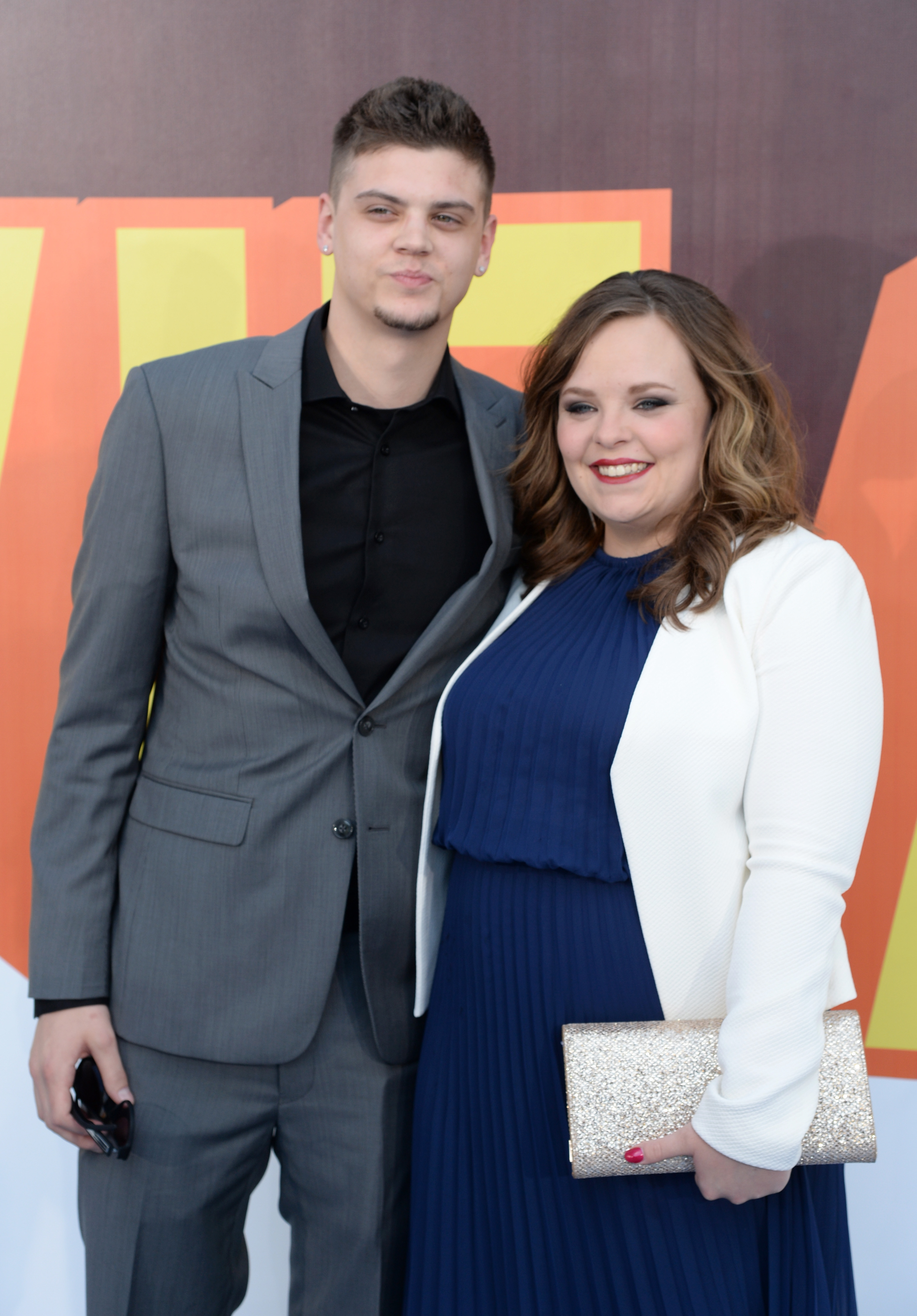 Catelynn and Tyler smile on the red carpet for photographers