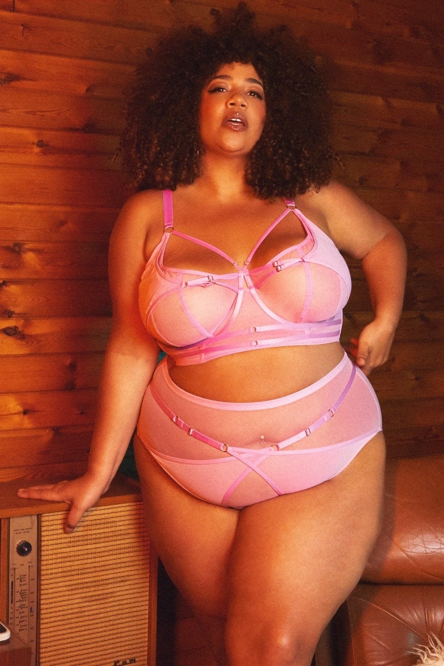 model wearing pink crossover bra