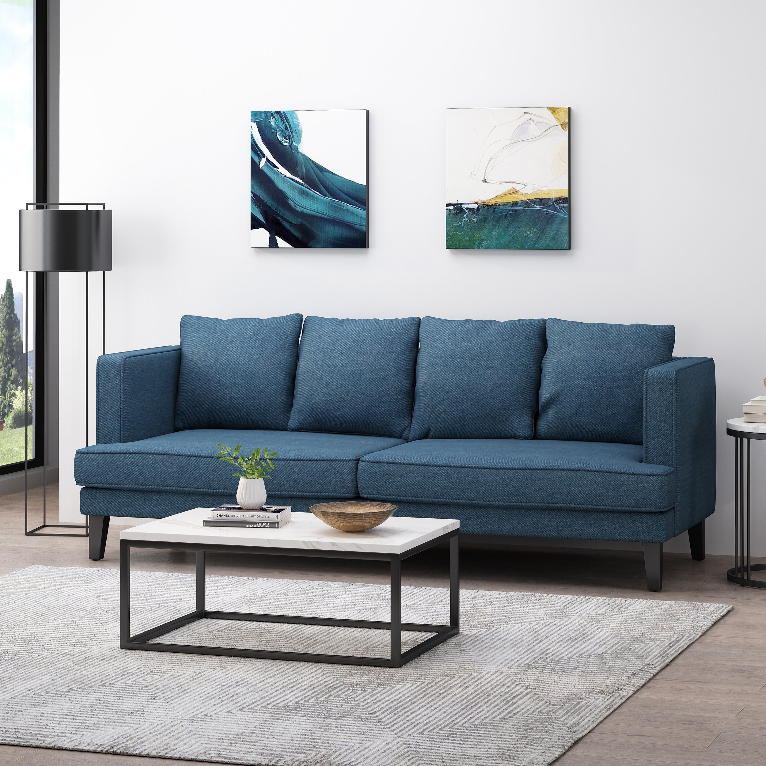 A dark blue sofa is shown