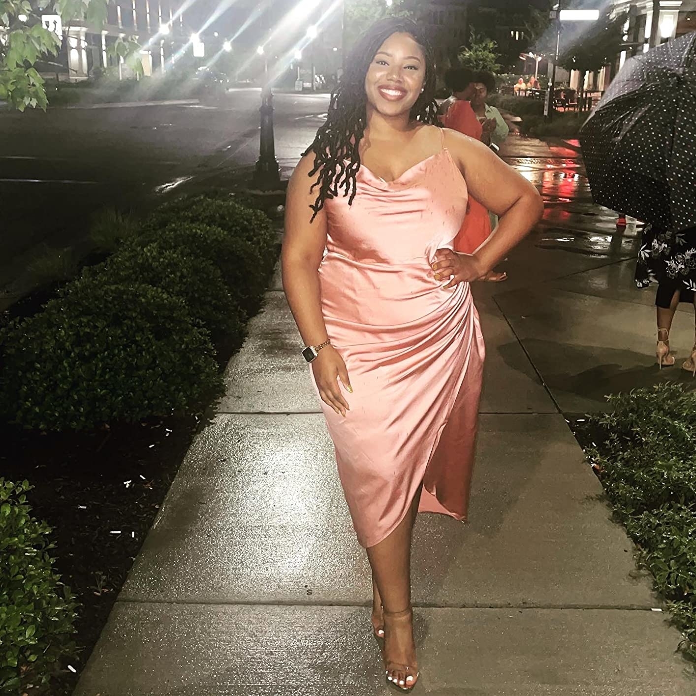 Reviewer wearing the peach colored dress