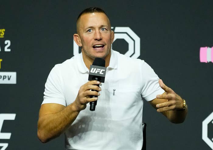 Former UFC two-division champion Georges St-Pierre is seen on stage during a Q&amp;A session