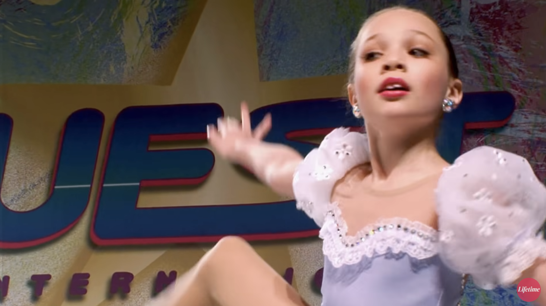 Close-up of Maddie as a young dancer