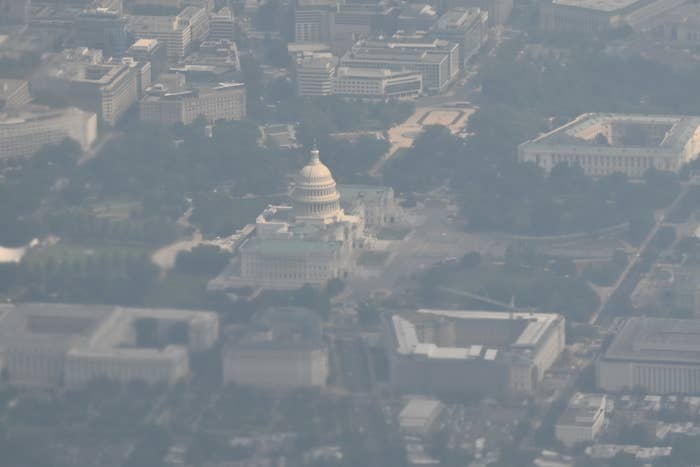 The U.S. Capitol Building under a film of haze