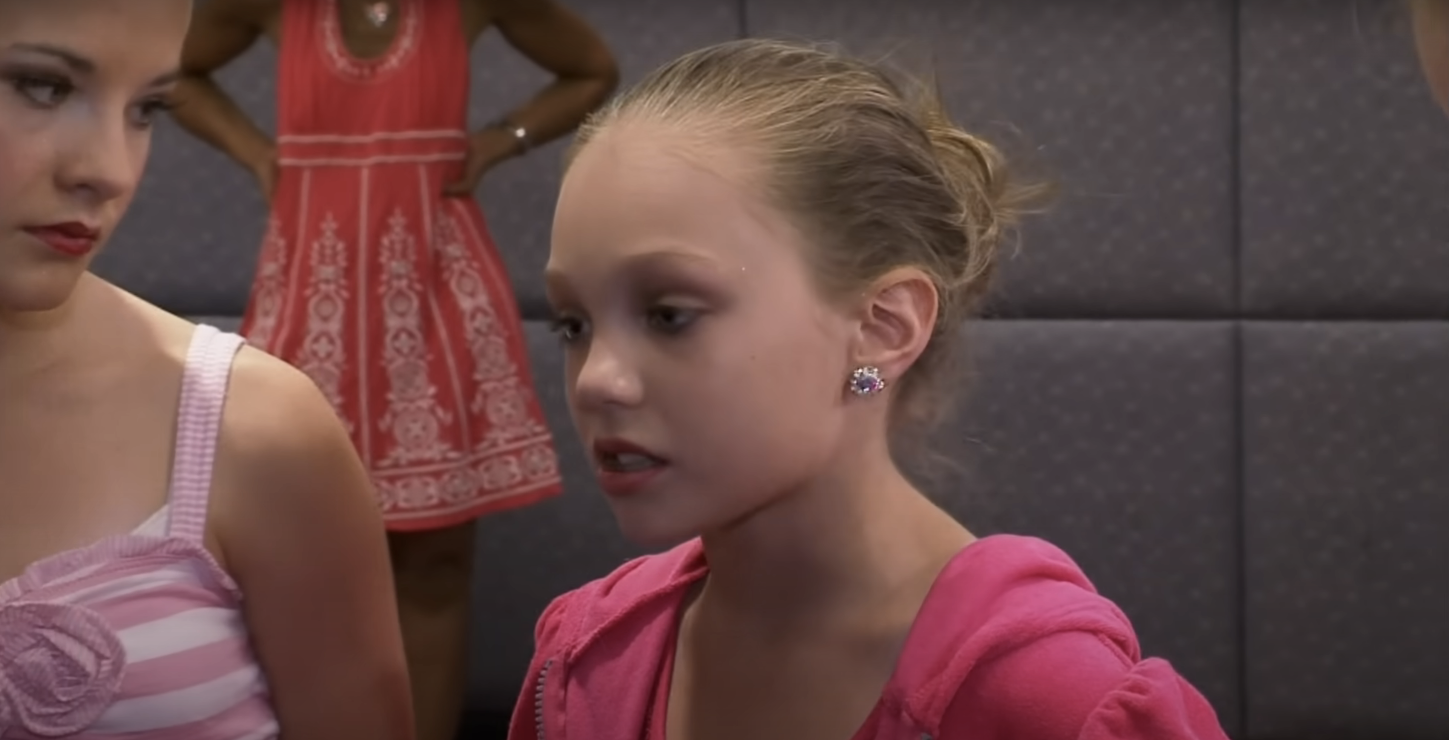 A close-up of a very young Maddie on Dance Moms