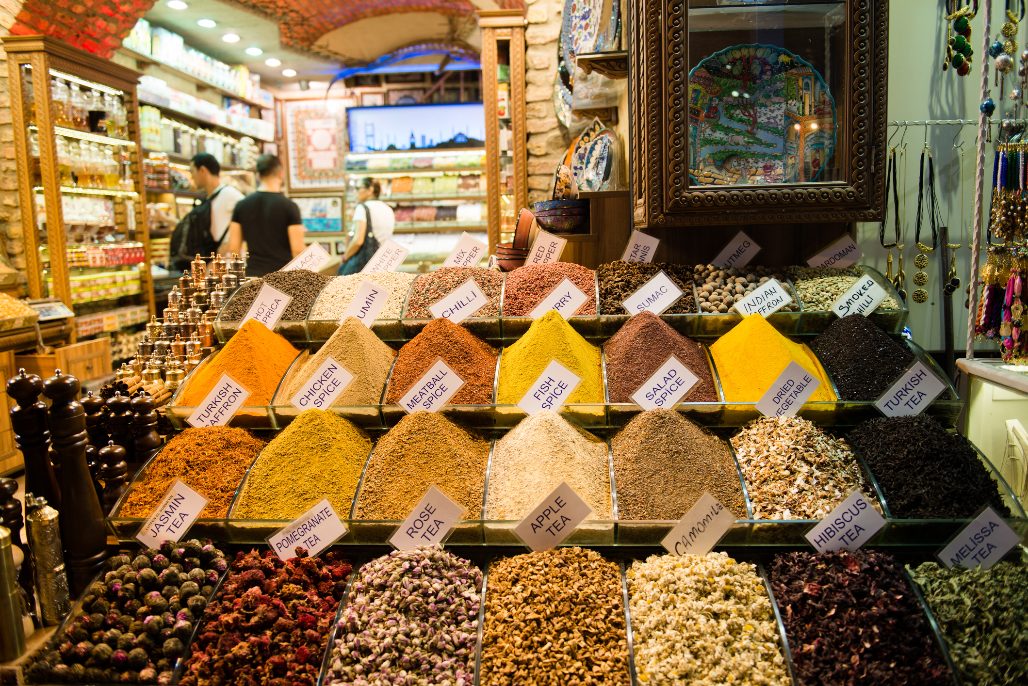 Rows of spices in a food stand