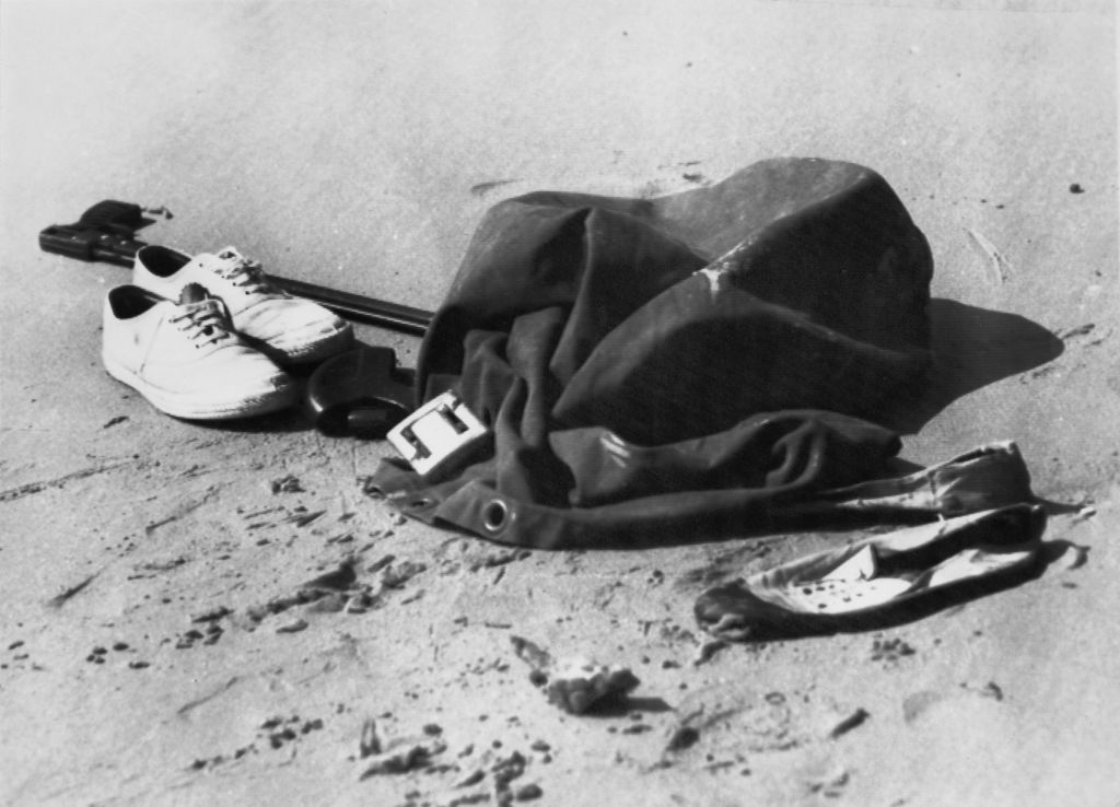 Holt&#x27;d pants, shoes and other belongings left on the beach