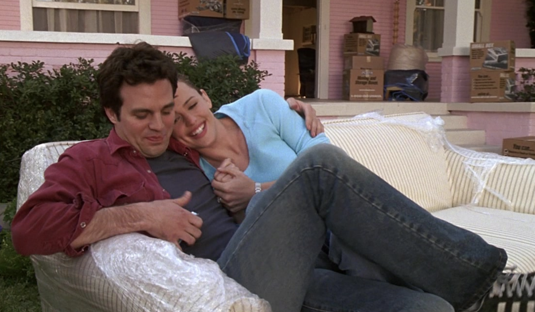Mark Ruffalo and Jennifer Garner sit on a couch at the end of &quot;13 Going on 30&quot;