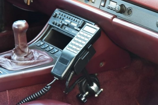 carphone in a red car interior