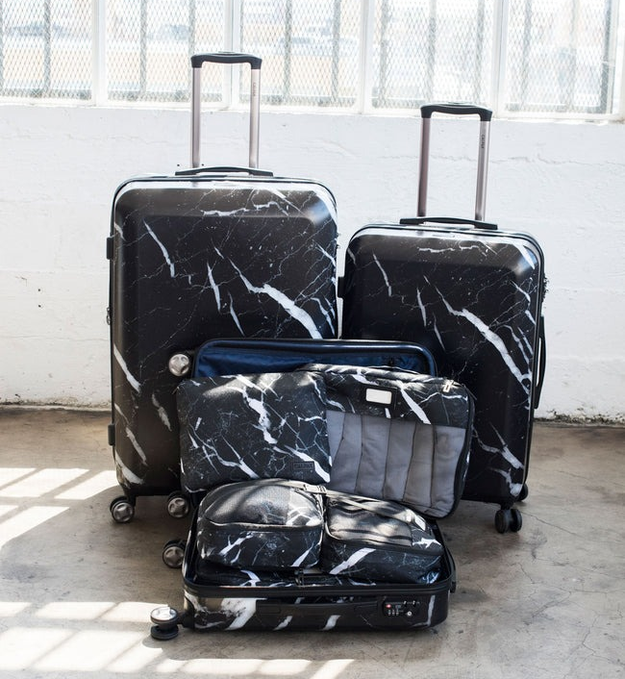 three-piece black marble suitcase set