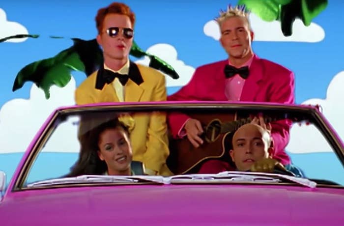 Aqua &quot;Barbie Girl&quot; music video clip of pink convertible with the group in the car giving punk band in a girl&#x27;s comic book vibes. 