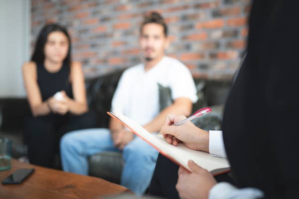 couples therapists taking notes