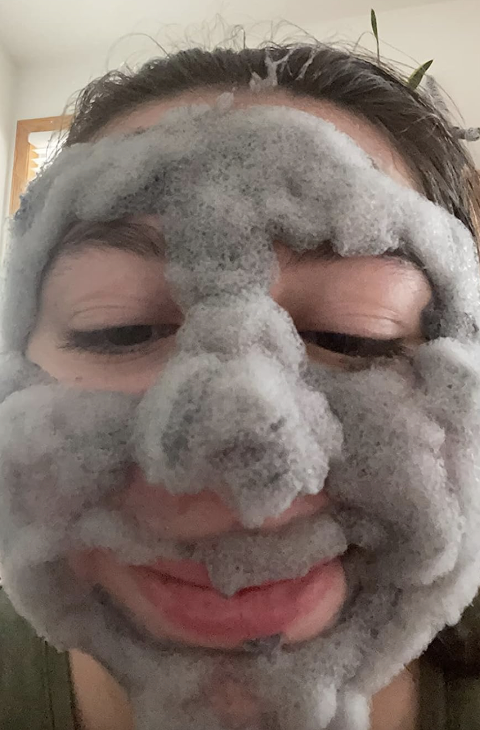 a reviewer with the mask bubbled on their face