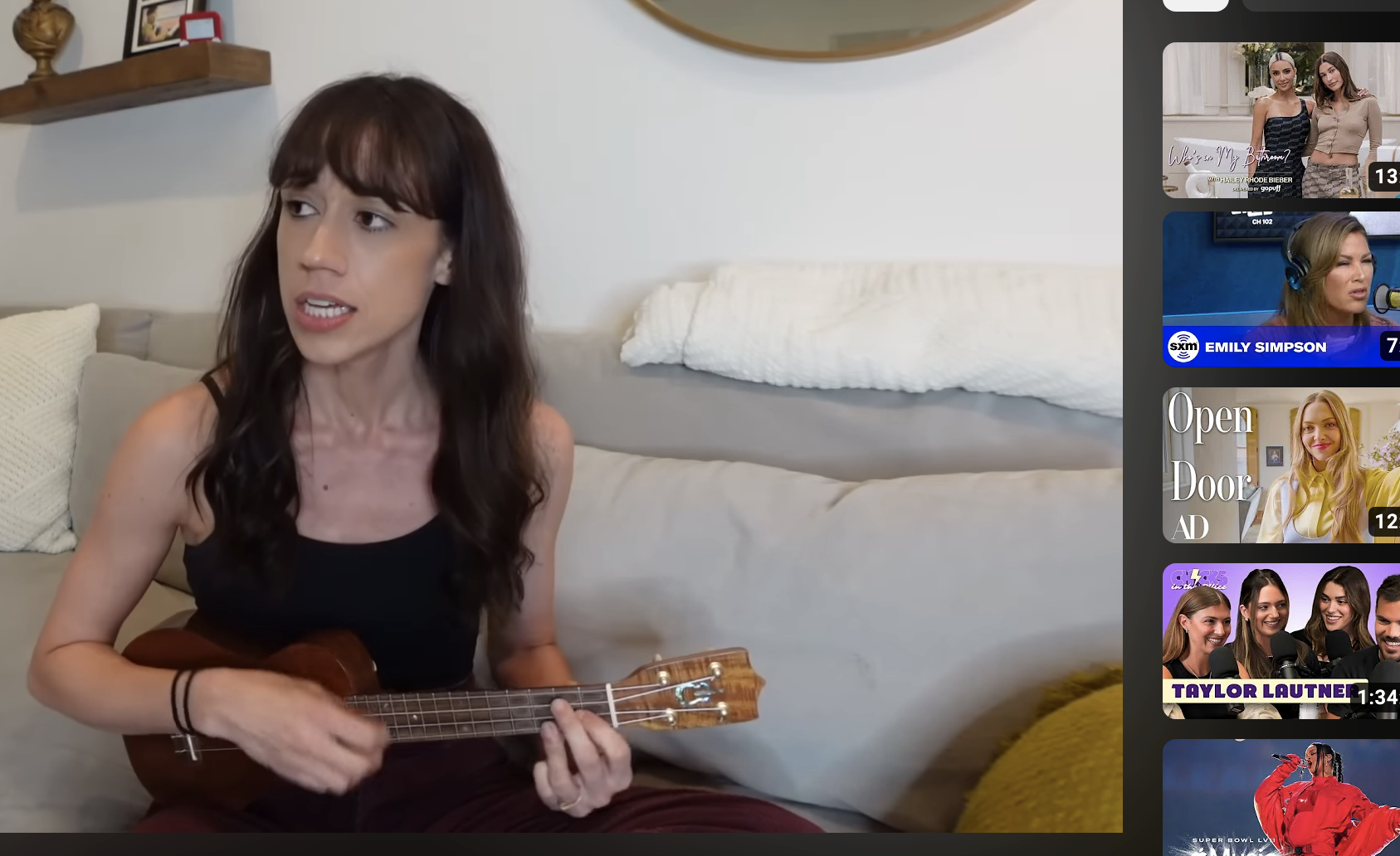 Colleen singing and playing the ukulele