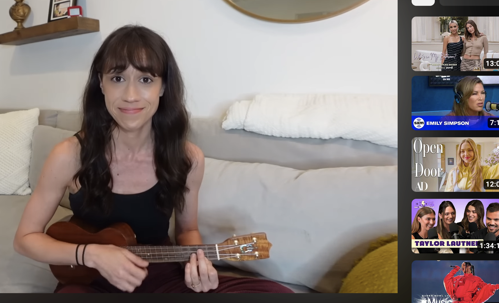 Closeup of Colleen playing the ukulele