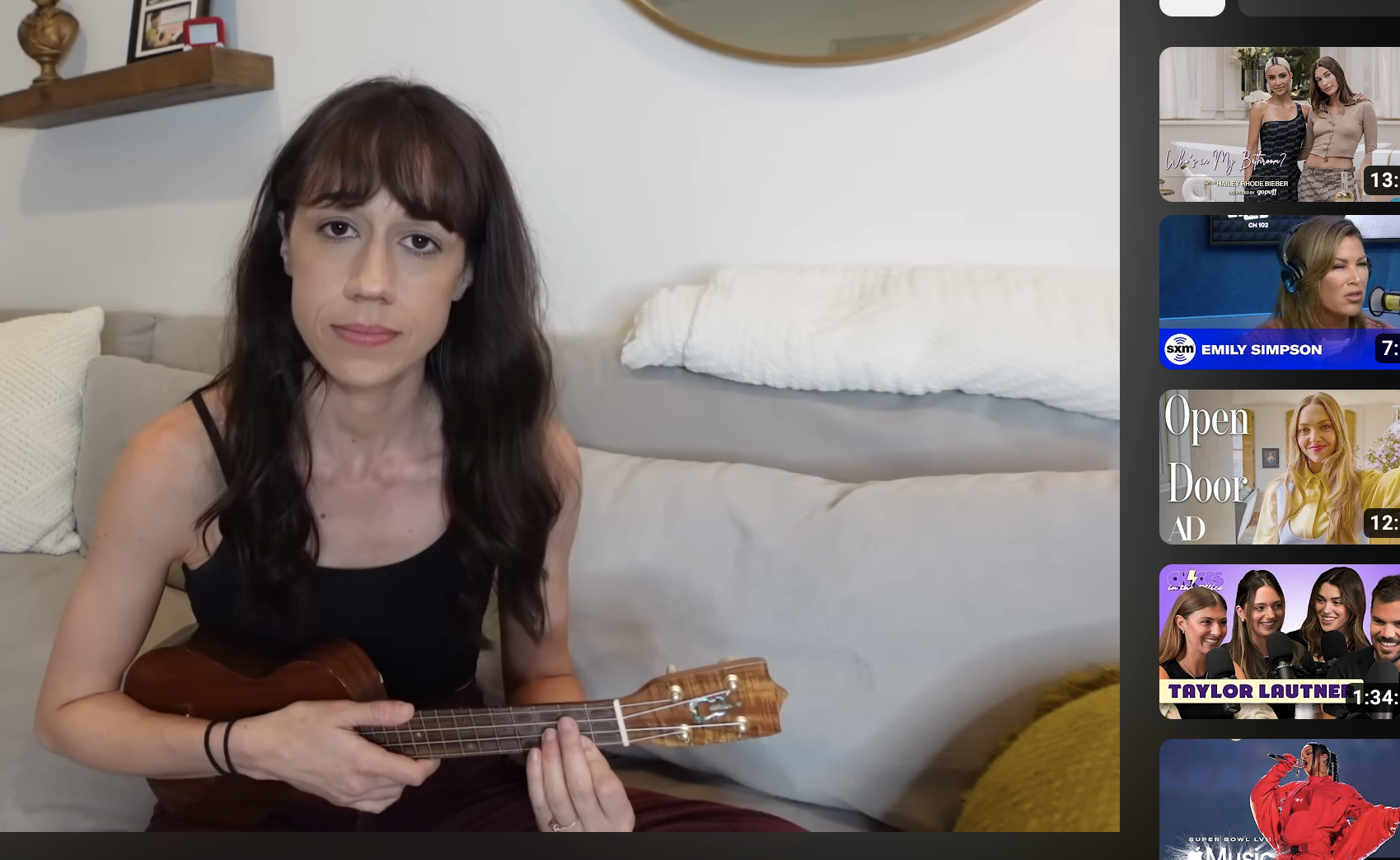 Closeup of Colleen playing the ukulele