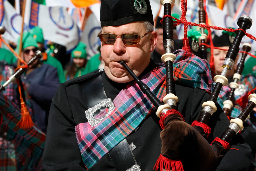 A man playing the bagpipes