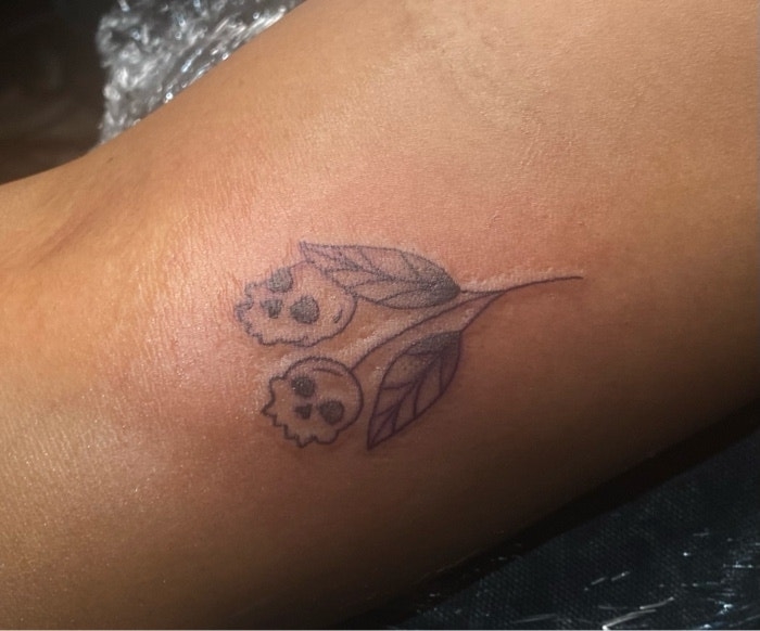 skull flower tattoo