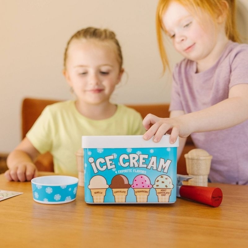 Kids play with an ice cream set