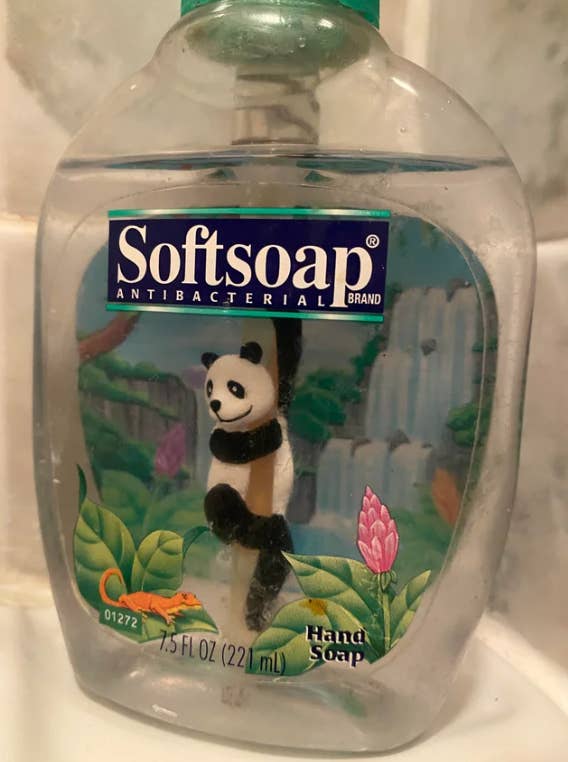 Close-up of a Softsoap Hand Soap with a panda bear and alligator on the packaging