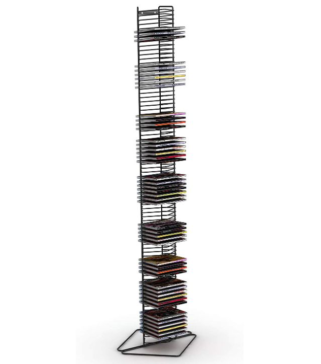 Close-up of a large CD tower partially filled with CDs