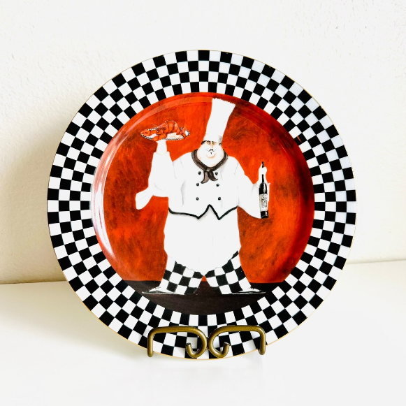 Close-up of a checkerboard-and-chef plate on a rack